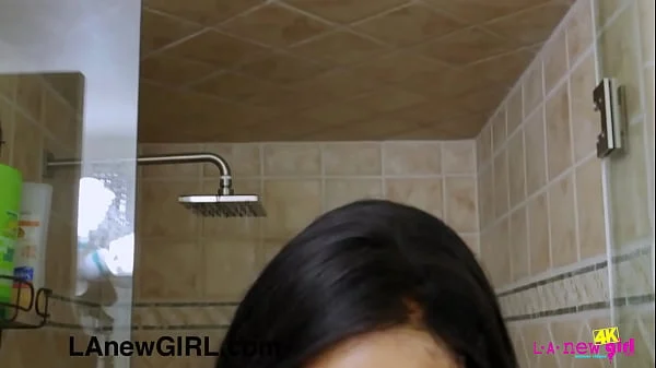 Striking brunette girl rinsed off